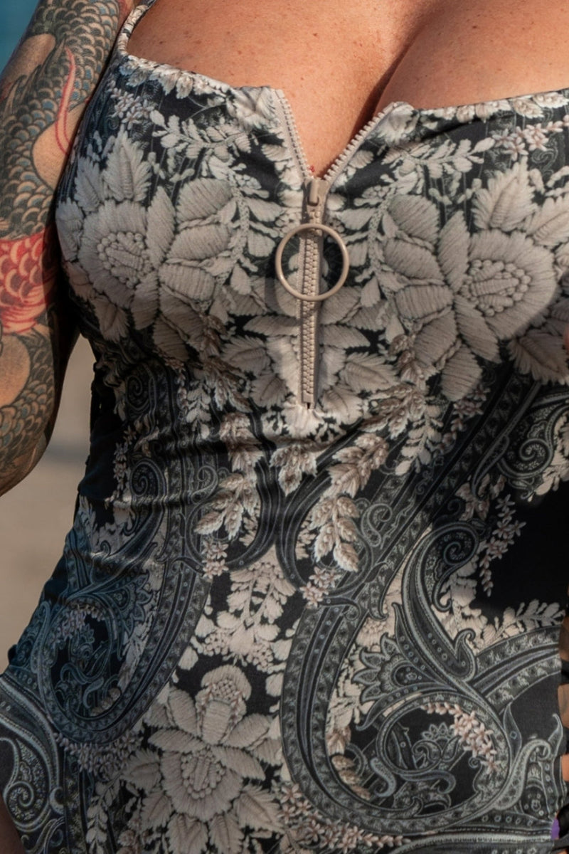 ONE-PIECE SWIMSUIT WITH ZIP AND SIDE TIES – FROZEN LOTUS