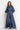 HIGH-WAISTED FLARED DENIM PANTS WITH FRONT SLITS - ESSENTIALS JIORO ПАНТАЛОН ОТ ТЪНЪК ДЕНИМ С ВИСОКА ТАЛИЯ И ЦЕПКИ – ESSENTIALS JIORO